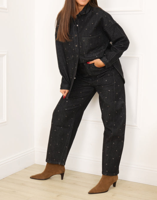 Jean œillet noir femme – Jean original avec détails métalliques